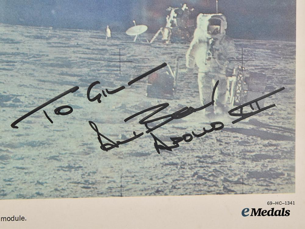 united_states._a_framed_print_of_an_apollo12_astronaut_on_the_moon_signed_by_lunar_module_pilot_alan_bean___m_n_c3838
