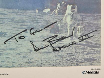 united_states._a_framed_print_of_an_apollo12_astronaut_on_the_moon_signed_by_lunar_module_pilot_alan_bean___m_n_c3838