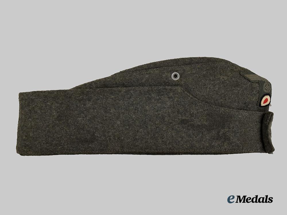 germany,_heer._an_e_m/_n_c_o’s_m42_field_cap,_by_l_a_g_o-_wien___m_n_c3926