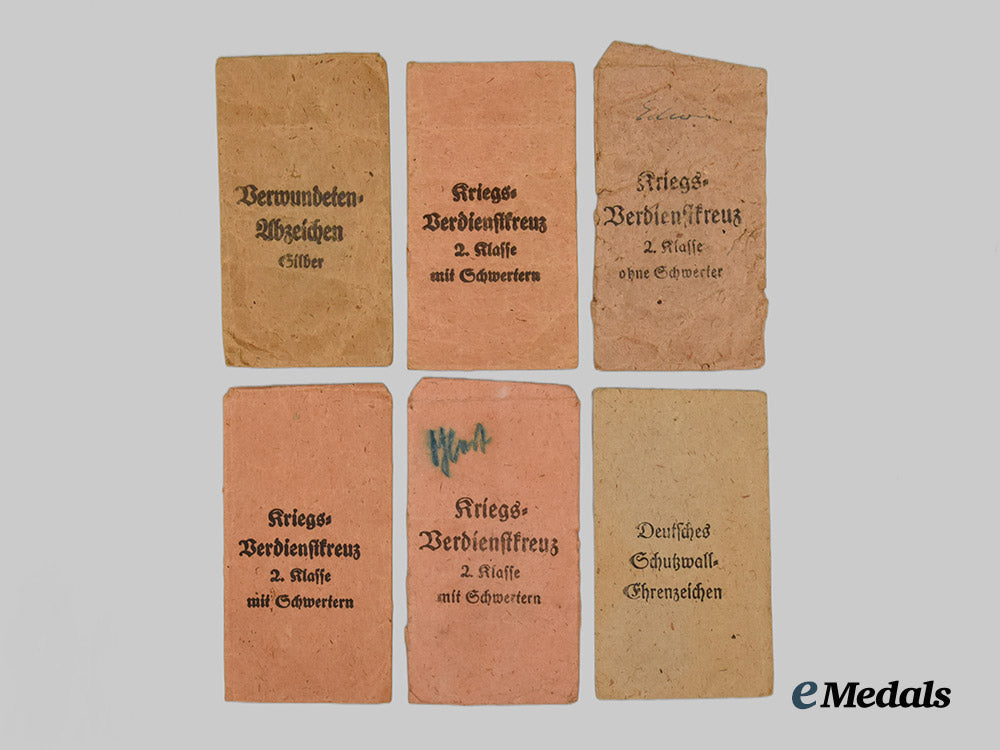 germany,_third_reich._a_group_of_political_award_presenatation_boxes_and_service_medal_paper_packets___m_n_c4195