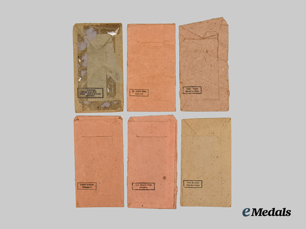 germany,_third_reich._a_group_of_political_award_presenatation_boxes_and_service_medal_paper_packets___m_n_c4196