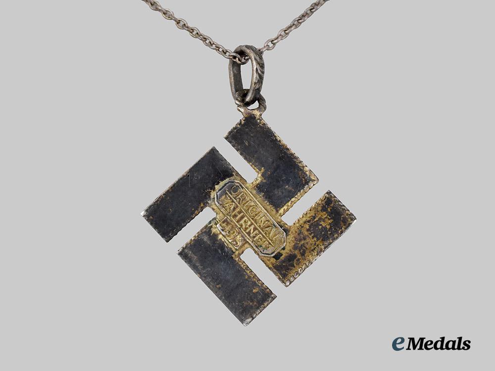 germany,_third_reich._a_germanic_folk_art_swastika_pendant_in_silver,_by_theodor_fahrner___m_n_c4228