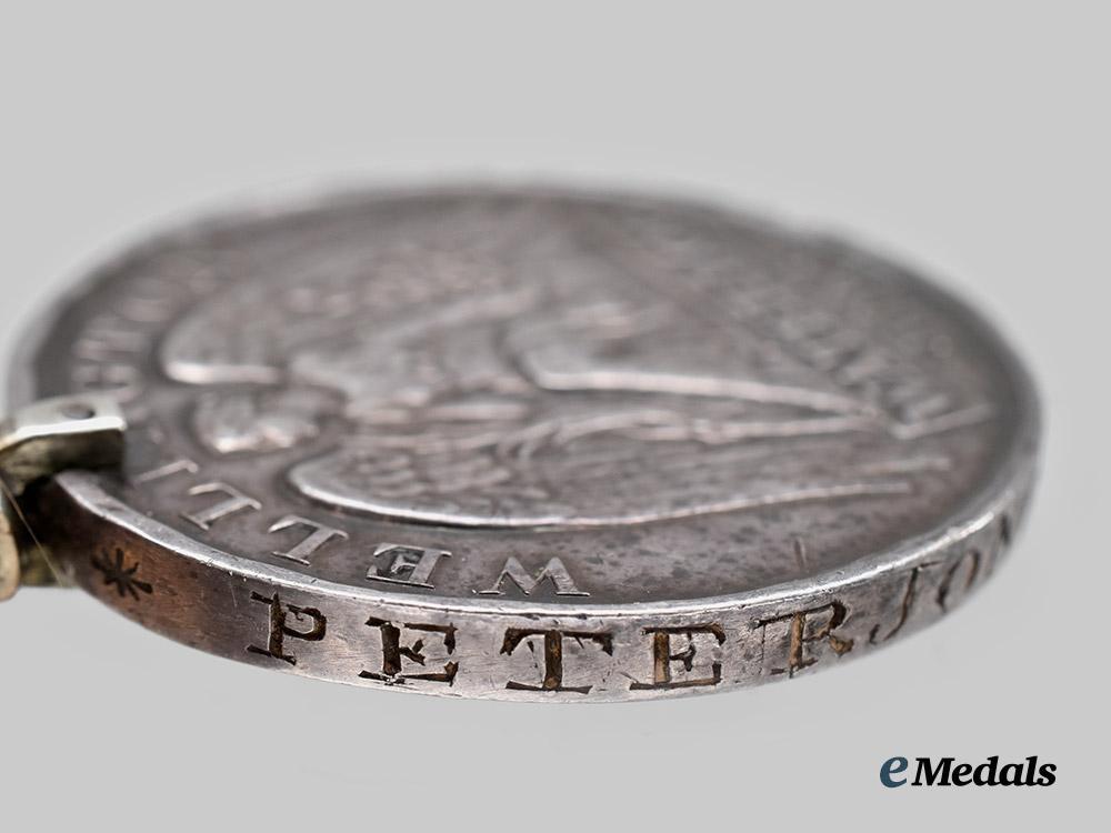 united_kingdom._an1815_battle_of_waterloo_medal_to_private_peter_jones_of_the23rd_regiment_of_foot,_royal_welsh_fusiliers___m_n_c4508