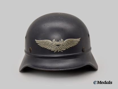 germany,_third_reich._a_luftschutz_m35_beaded_stahlhelm,_by_f._w._quist___m_n_c4720