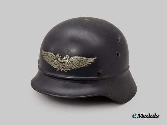 germany,_third_reich._a_luftschutz_m35_beaded_stahlhelm,_by_f._w._quist___m_n_c4722