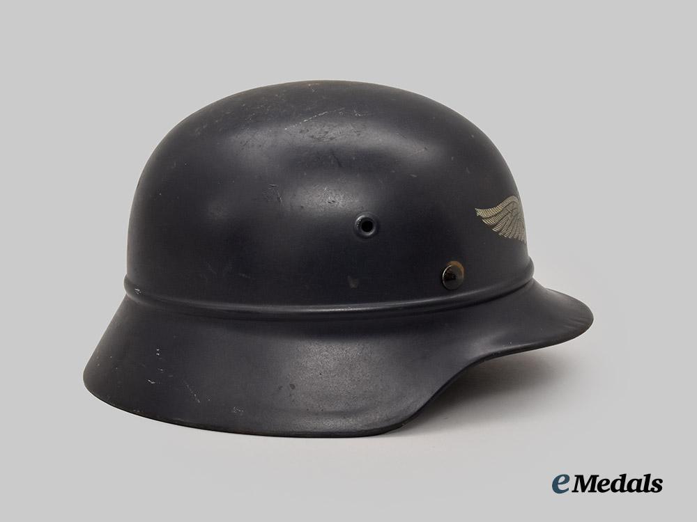 germany,_third_reich._a_luftschutz_m35_beaded_stahlhelm,_by_f._w._quist___m_n_c4724