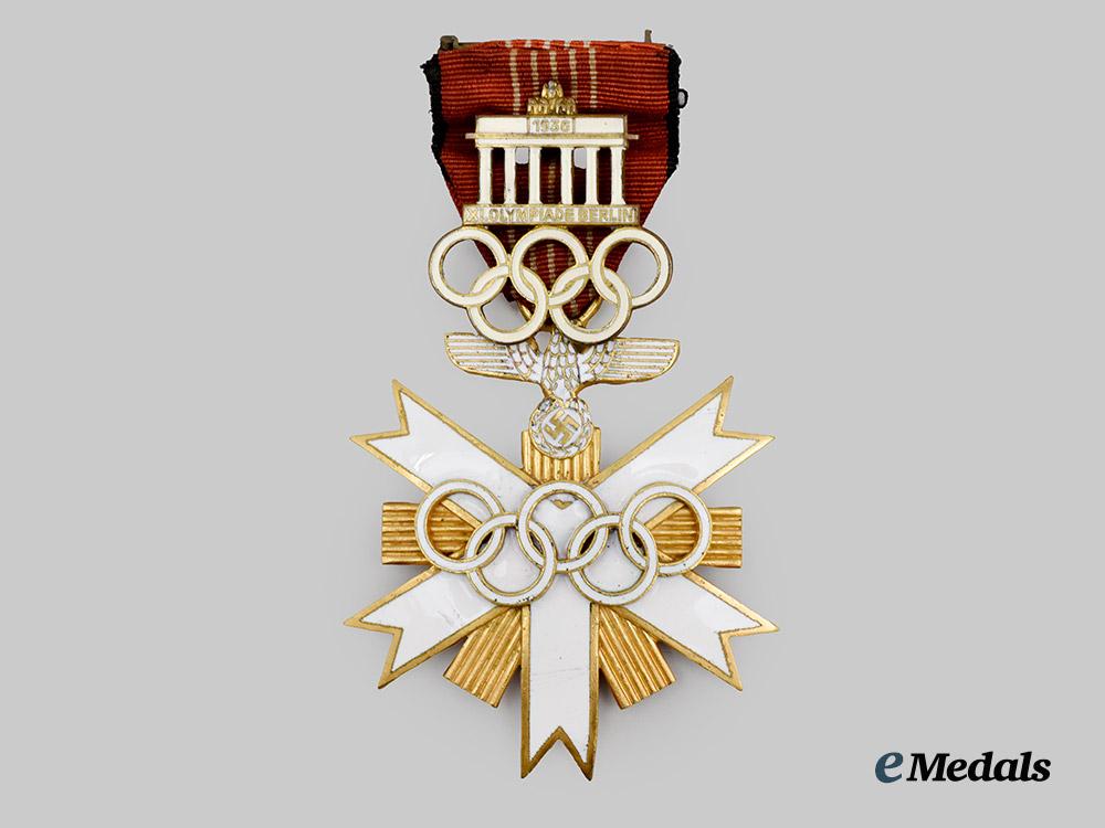 germany,_third_reich._a_rare_olympic_games_decoration,_i_i_class_with_visitor’s_badge,_by_godet___m_n_c4835-_recovered