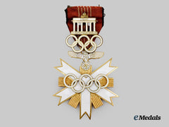 Germany, Third Reich. A Rare Olympic Games Decoration, II Class with Visitor’s Badge, by Godet