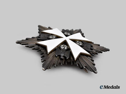 germany,_third_reich._an_order_of_the_german_eagle,_i_i_class_breast_star,_by_gebrüder_godet___m_n_c4879-_recovered