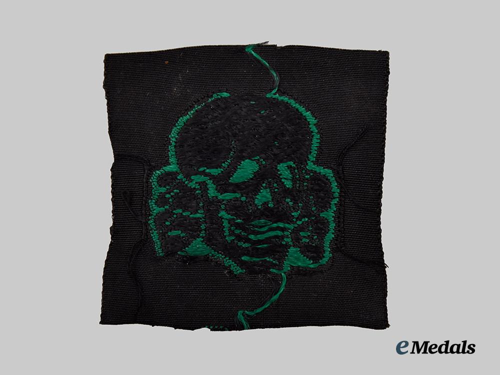 germany,_s_s._a_rare_and_mint_set_of_waffen-_s_s_camouflage_field_cap_insignia___m_n_c4894