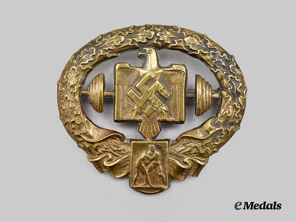 germany,_third_reich._a_rare_heavy_athletics_sports_badge,_bronze_grade,_owner-_attributed_example___m_n_c5084