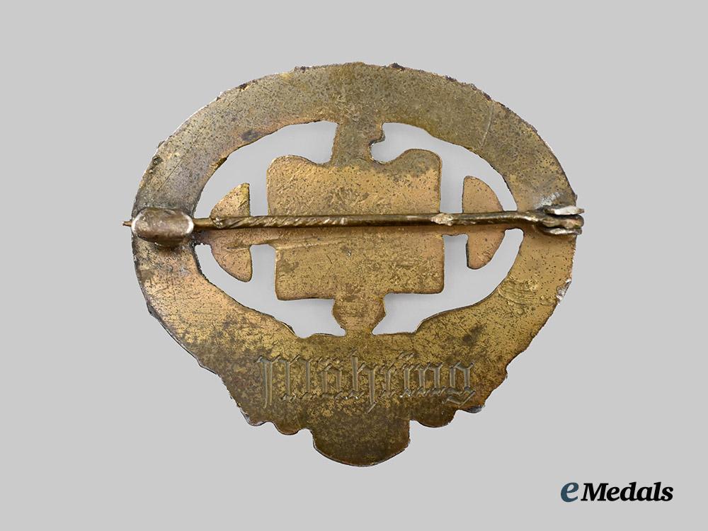 germany,_third_reich._a_rare_heavy_athletics_sports_badge,_bronze_grade,_owner-_attributed_example___m_n_c5086