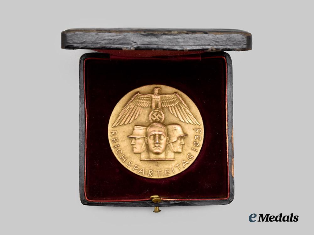 germany,_n_s_d_a_p._a1935_nuremberg_rally_commemorative_medal,_with_case,_by_deschler&_sohn___m_n_c5106