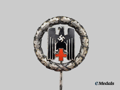 germany,_third_reich._a_german_red_cross_honour_badge,_stick_pin_variant_by_c._e._juncker_of_berlin___m_n_c5223