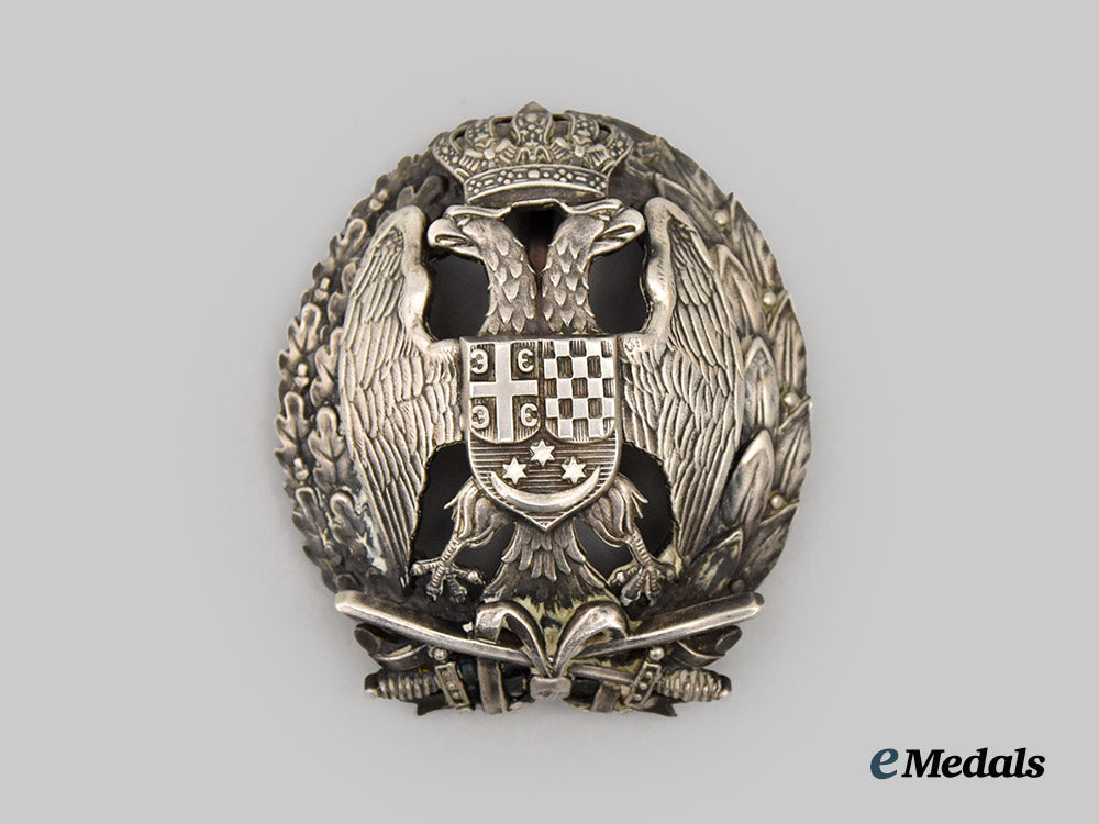 yugoslavia,_kingdom._a_badge_of_the_cavalry_military_academy,_by_karnet-_kisely,_c.1935___m_n_c5337