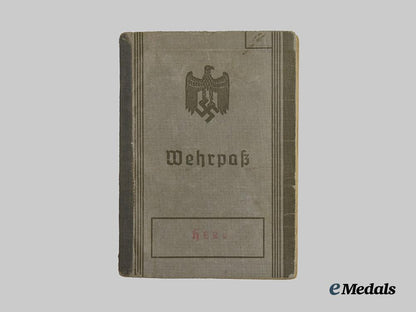 germany,_wehrmacht._a_mixed_lot_of_service_books_to_decorated_eastern_and_western_front_combatants___m_n_c5457