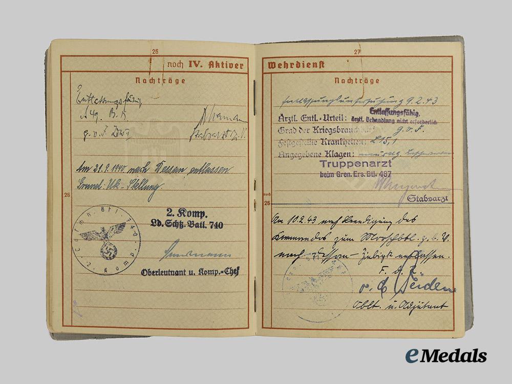 germany,_wehrmacht._a_mixed_lot_of_service_books_to_decorated_eastern_and_western_front_combatants___m_n_c5461