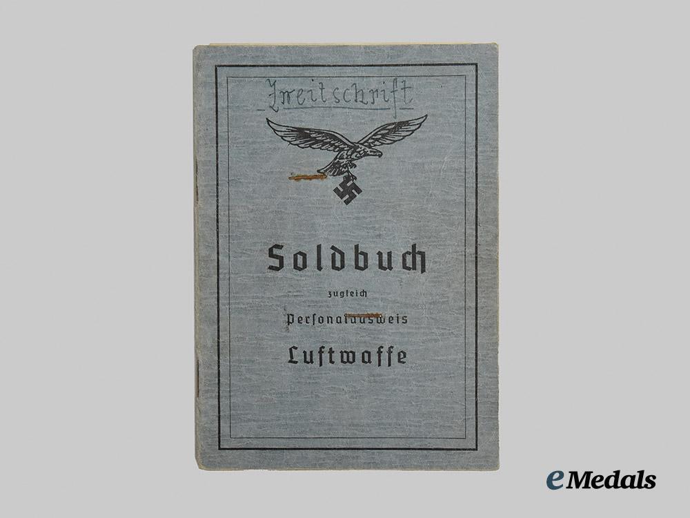 germany,_wehrmacht._a_mixed_lot_of_service_books_to_decorated_eastern_and_western_front_combatants___m_n_c5466