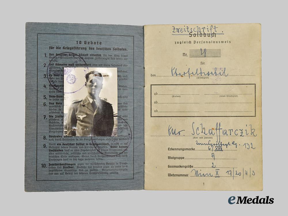 germany,_wehrmacht._a_mixed_lot_of_service_books_to_decorated_eastern_and_western_front_combatants___m_n_c5467