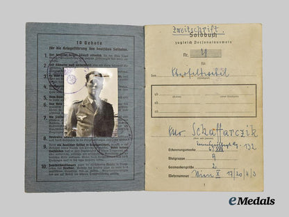 germany,_wehrmacht._a_mixed_lot_of_service_books_to_decorated_eastern_and_western_front_combatants___m_n_c5467