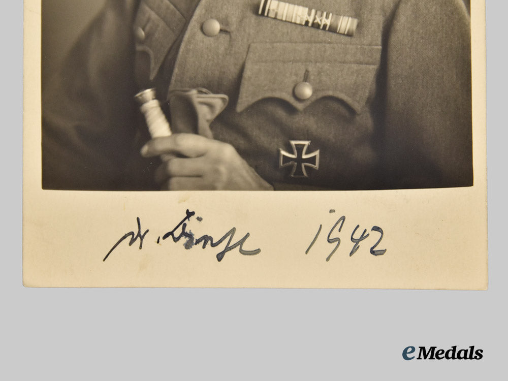 germany,_wehrmacht._a_pair_of_dedicated_studio_portraits_of_decorated_wehrmacht_officers___m_n_c5934