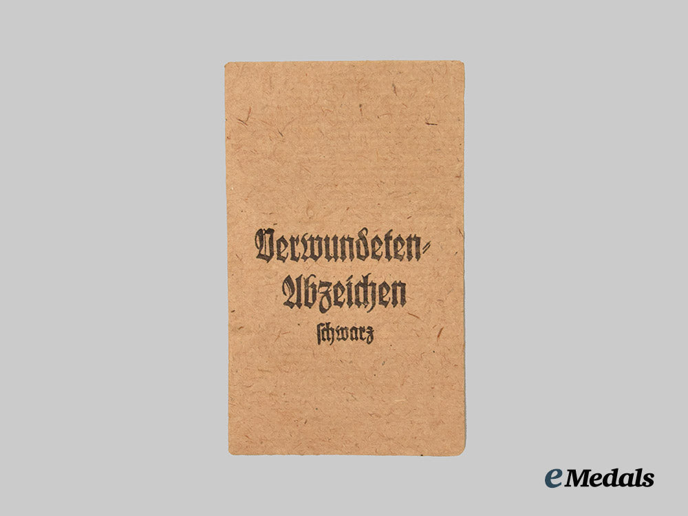 german,_wehrmacht._a_black_grade_wound_badge,_with_recipient_photo,_by_heinrich_wander___m_n_c5947