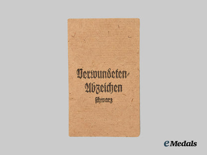 german,_wehrmacht._a_black_grade_wound_badge,_with_recipient_photo,_by_heinrich_wander___m_n_c5947
