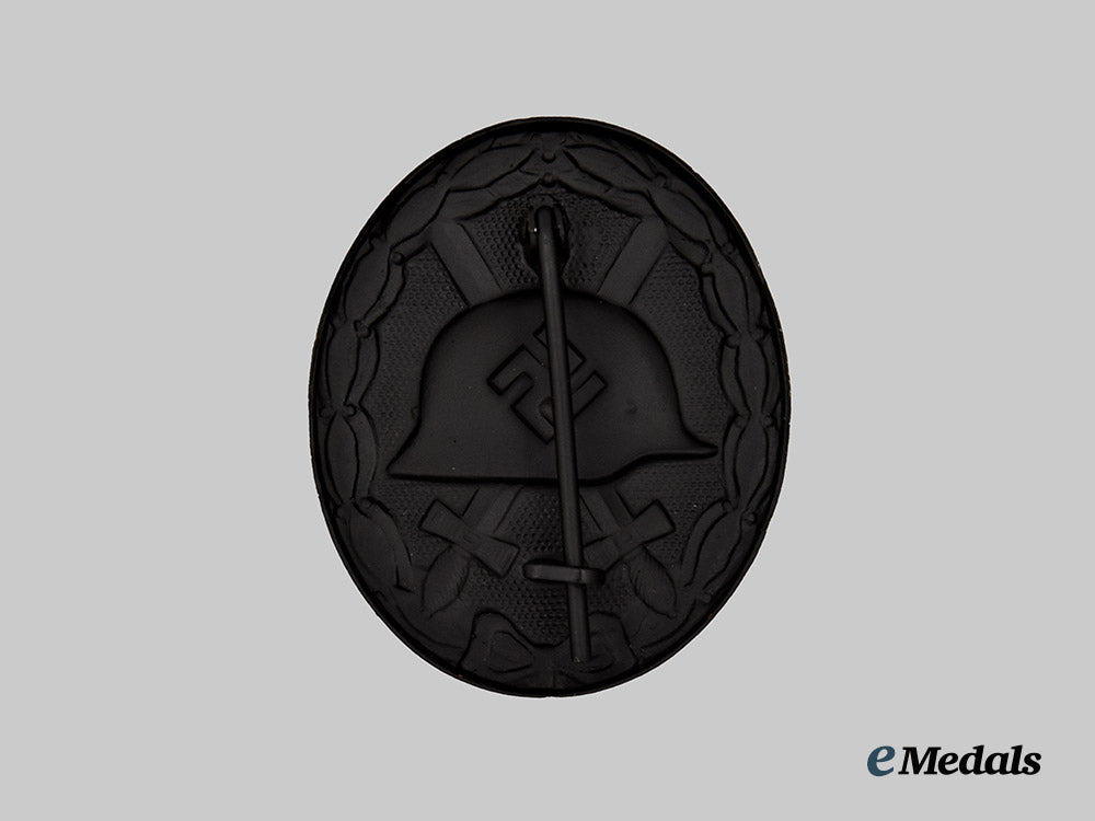 german,_wehrmacht._a_black_grade_wound_badge,_with_recipient_photo,_by_heinrich_wander___m_n_c5950