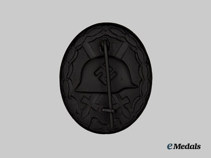 german,_wehrmacht._a_black_grade_wound_badge,_with_recipient_photo,_by_heinrich_wander___m_n_c5950