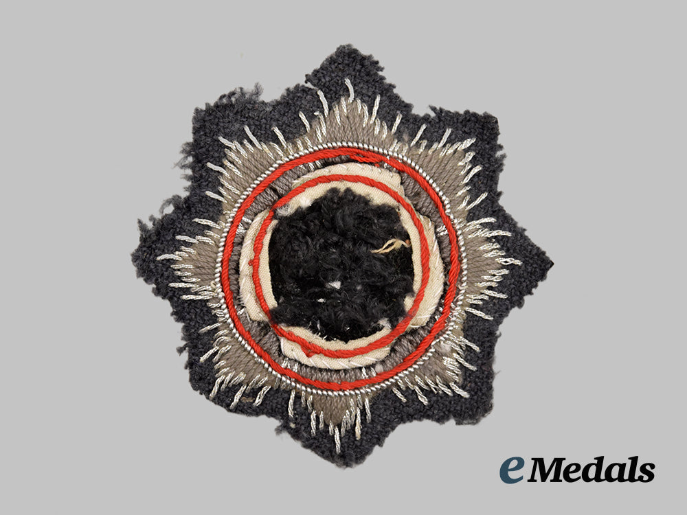 germany,_luftwaffe._a_german_cross_in_gold,_cloth_version,_modified_for_postwar_wear___m_n_c5966