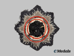 Germany, Luftwaffe. A German Cross in Gold, Cloth Version, Modified for Postwar Wear