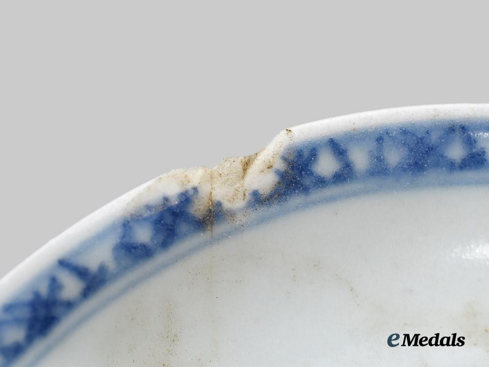 china,_empire._a_three-_piece_set_of_porcelain_recovered_from_the_geldermalsen;_the_nanking_cargo,_c.1752___m_n_c6079