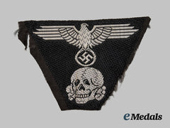 Germany, SS. A Waffen-SS Panzer Personnel One-Piece Eagle and Totenkopf Cap Insignia
