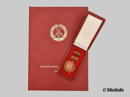 germany,_democratic_republic._a_patriotic_order_of_merit,_bronze_grade_with_case_and_award_document_to_rudi_höllering___m_n_c6222