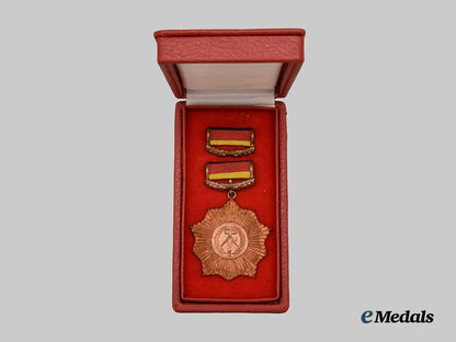 germany,_democratic_republic._a_patriotic_order_of_merit,_bronze_grade_with_case_and_award_document_to_rudi_höllering___m_n_c6225