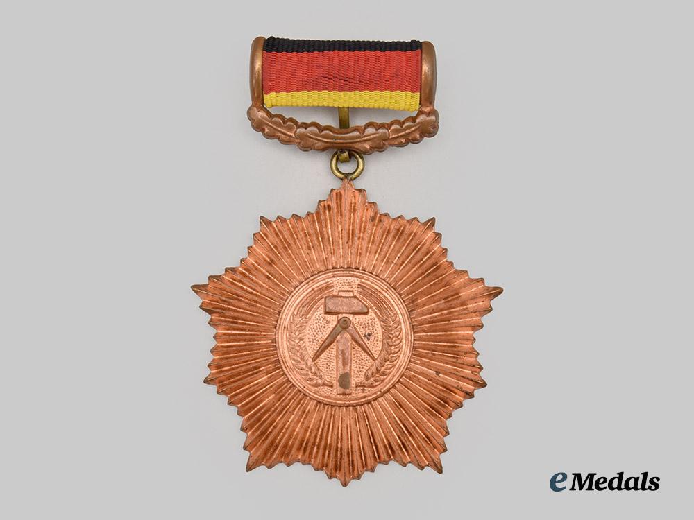 germany,_democratic_republic._a_patriotic_order_of_merit,_bronze_grade_with_case_and_award_document_to_rudi_höllering___m_n_c6228