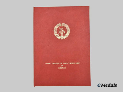 germany,_democratic_republic._a_patriotic_order_of_merit,_bronze_grade_with_case_and_award_document_to_rudi_höllering___m_n_c6232