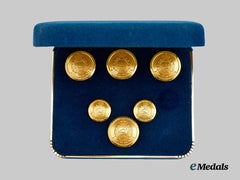 British Hong Kong, Territory. A Cased Set of Six Royal Hong Kong Police Uniform Buttons