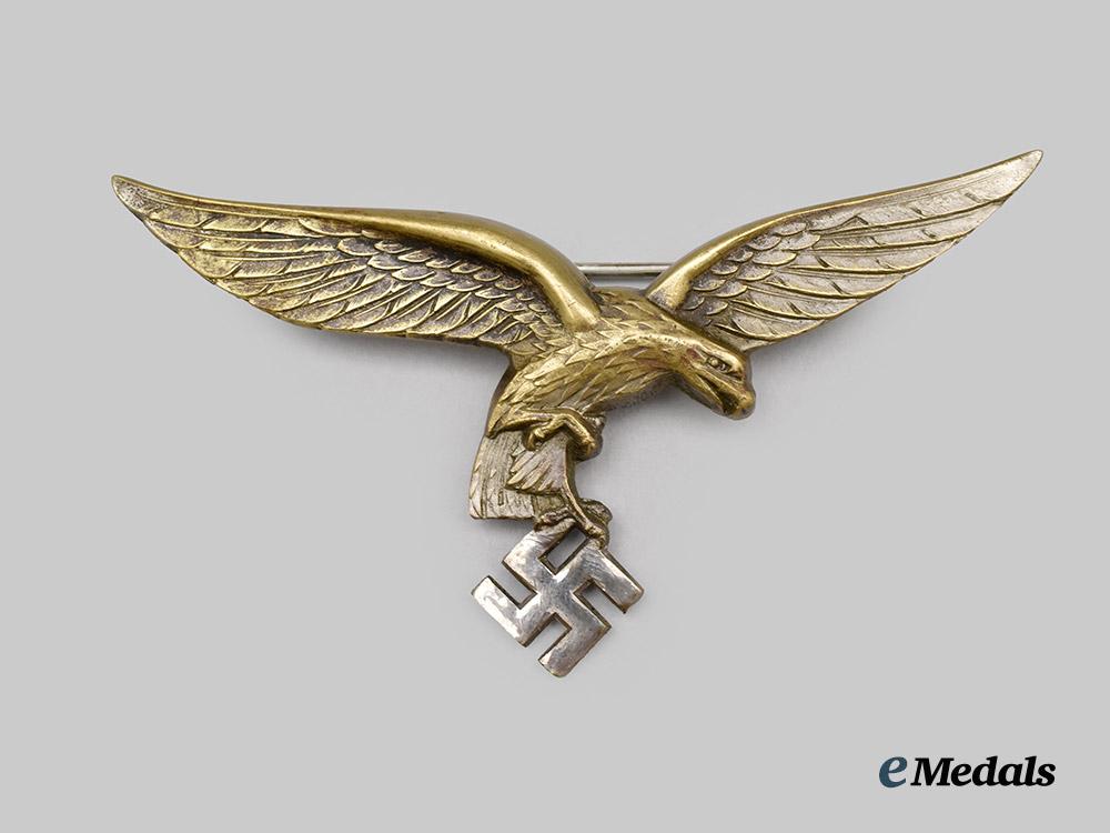 germany,_luftwaffe._a_rare_first_pattern_summer_uniform_breast_eagle_for_enlisted_ranks_and_non-_commissioned_officers___m_n_c6484
