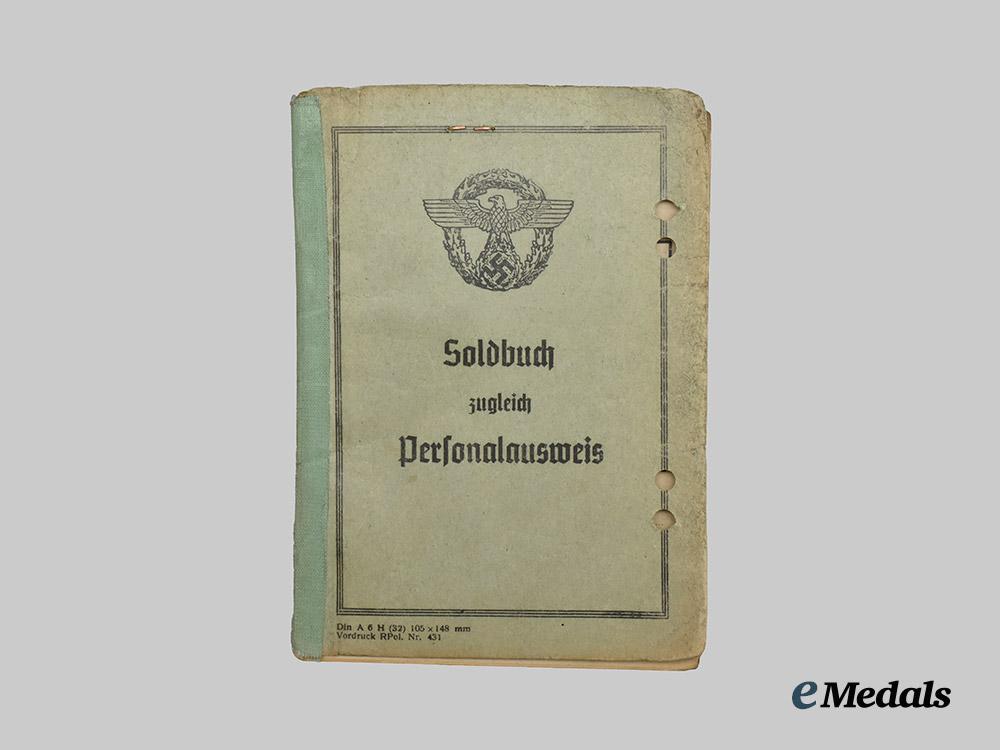 germany,_ordnungspolizei._a_mixed_lot_of_service_books___m_n_c6505