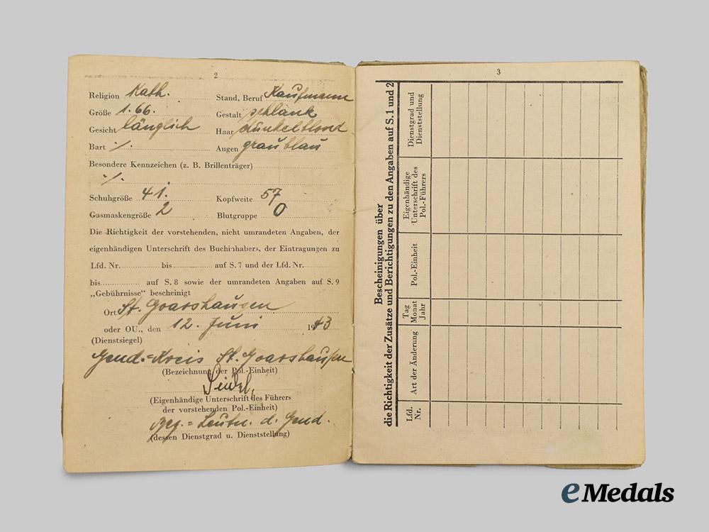 germany,_ordnungspolizei._a_mixed_lot_of_service_books___m_n_c6513