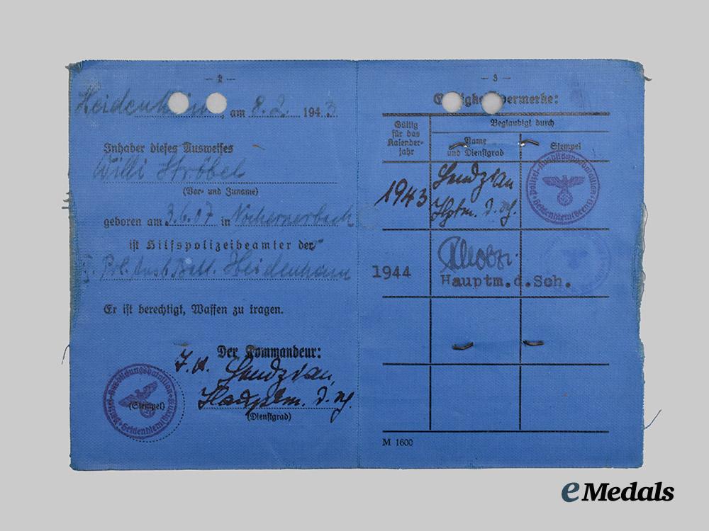 germany,_ordnungspolizei._a_mixed_lot_of_service_books___m_n_c6524