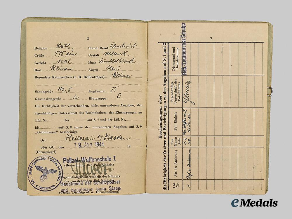 germany,_ordnungspolizei._a_mixed_lot_of_service_books___m_n_c6527