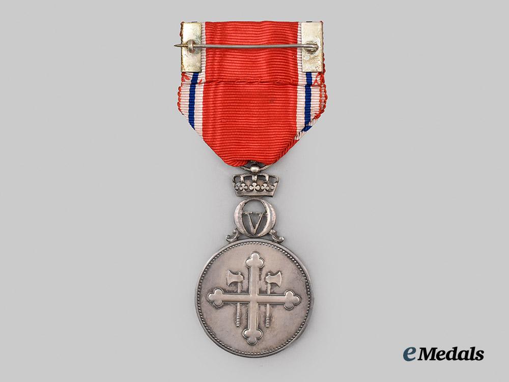 norway,_kingdom._st._olaf’s_medal_with_monogram_of_king_olav_v___m_n_c6704