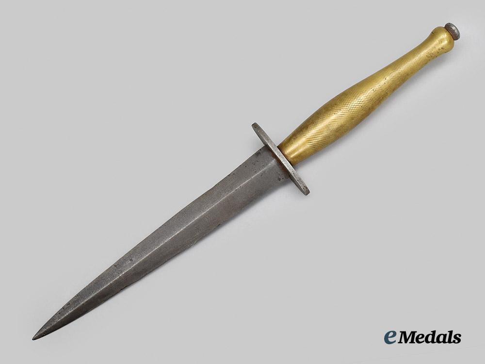 united_kingdom._a_well_worn_wilkinson_second_pattern_fairbairn_sykes_knife___m_n_c7009