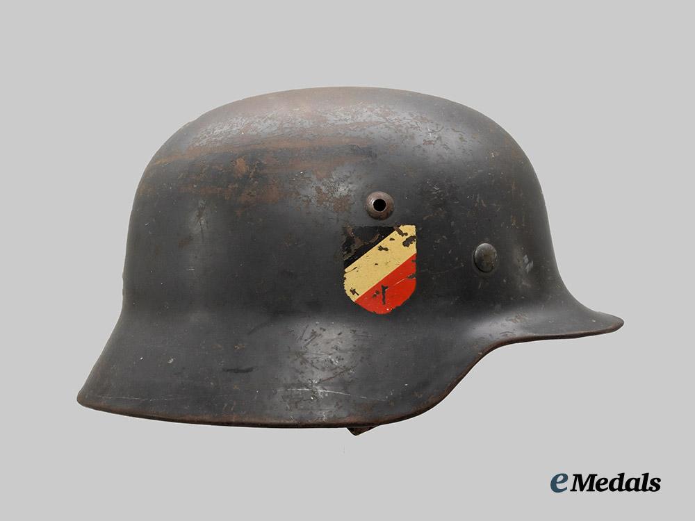 germany,_luftwaffe._an_m40_stahlhelm,_double_decal_and_owner-_attributed_example,_by_eisenhüttenwerke_thale___m_n_c7042