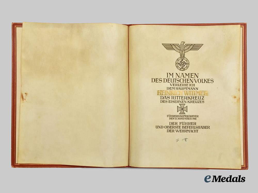 germany,_luftwaffe._a_formal_knight’s_cross_of_the_iron_cross_award_document_to_hauptmann_heinrich_wittmer,_kampfgeschwader55___m_n_c7072