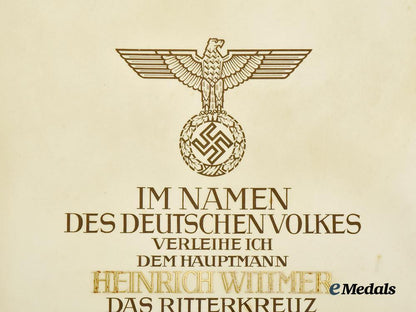 germany,_luftwaffe._a_formal_knight’s_cross_of_the_iron_cross_award_document_to_hauptmann_heinrich_wittmer,_kampfgeschwader55___m_n_c7073
