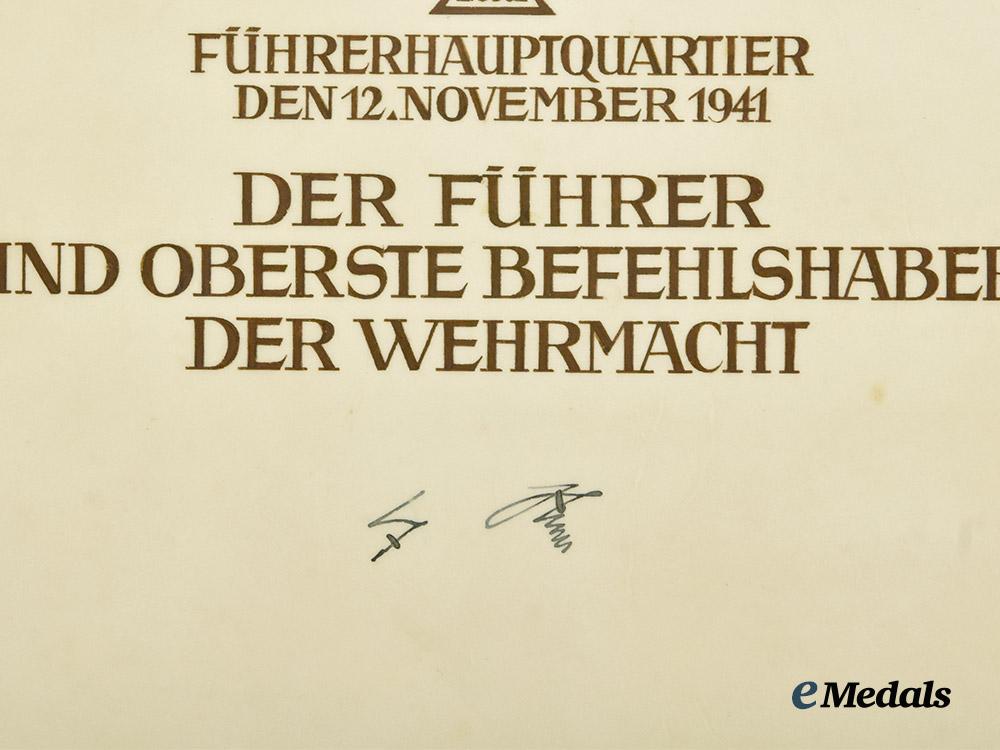 germany,_luftwaffe._a_formal_knight’s_cross_of_the_iron_cross_award_document_to_hauptmann_heinrich_wittmer,_kampfgeschwader55___m_n_c7074
