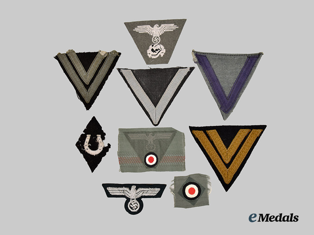 germany,_third_reich._a_mixed_lot_of_nine_uniform_insignia___m_n_c7080